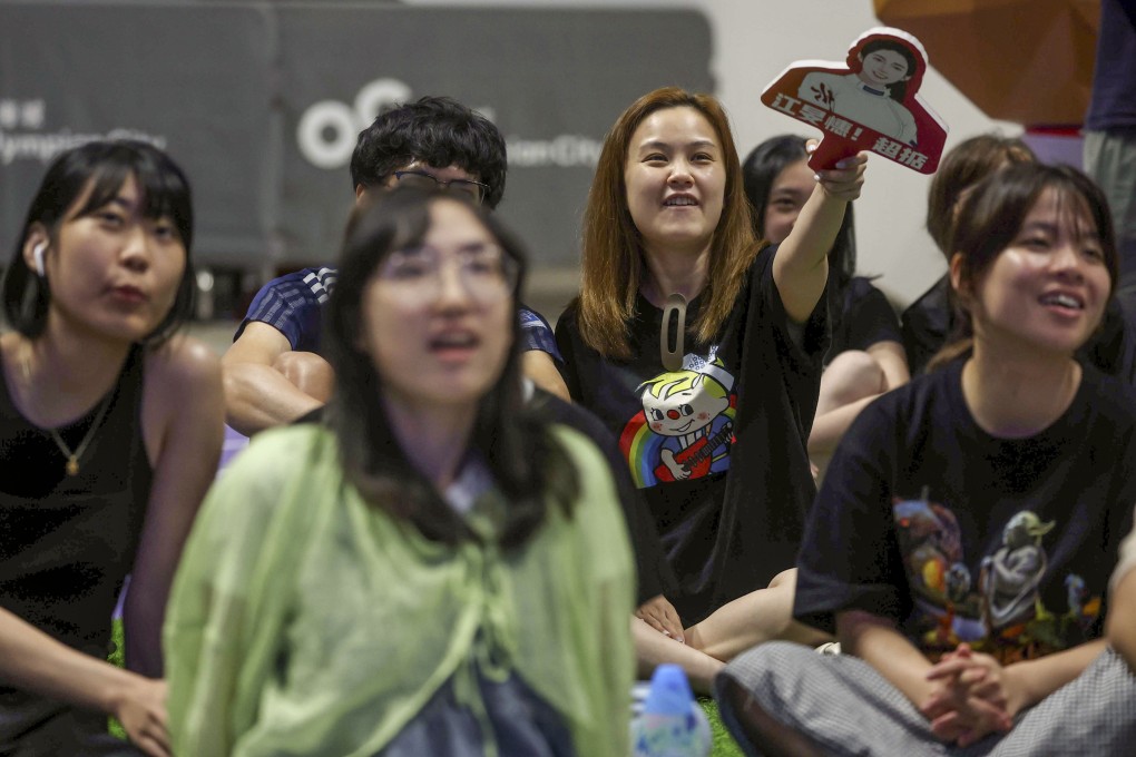 Fans gather at a big screen in the Olympian City shopping centre in Tai Kok Tsui to cheer on Vivian Kong as she fights her way to a fencing gold at the Paris Olympics. Photo: Edmond So
