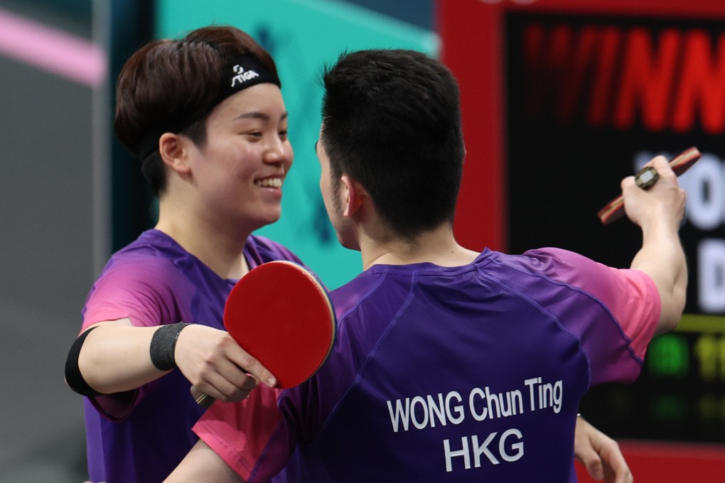 Hong Kong’s mixed doubles pair Doo Hoi-kem (left) and Wong Chun-ting are just one victory away from a guaranteed medal. Photo: Xinhua