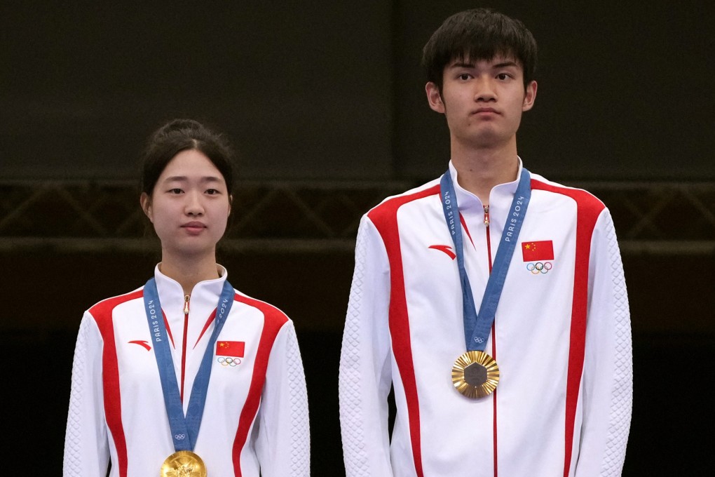 Huang Yuting (left) has attracted visitors to her Chinese village after clinching gold with 10m air rifle mixed doubles with Sheng Lihao. Photo: Reuters