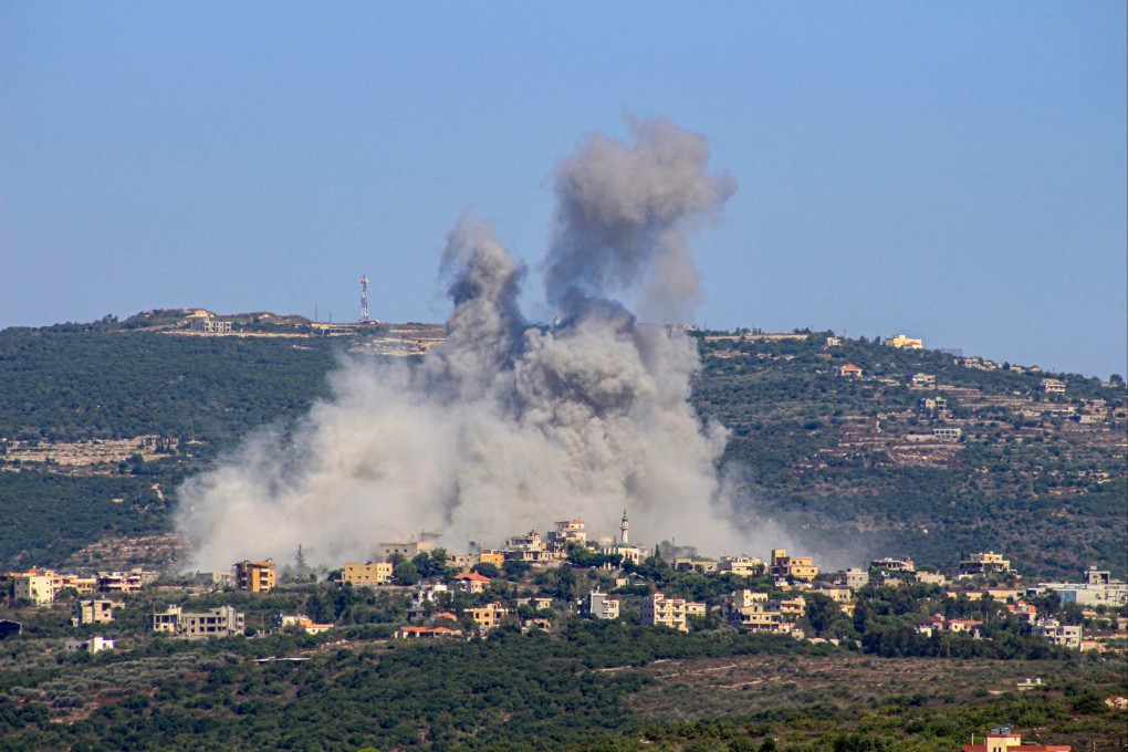 Smoke billows after an Israeli air strike in the southern Lebanese border village of Chihine on Sunday. Photo: AFP