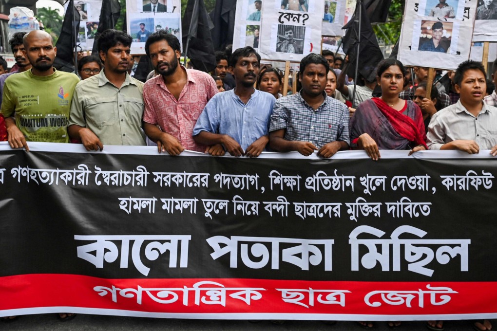 People take part in a protest march against the mass arrest and killing of protesters during last week’s violence amid anti-qouta protests, in Dhaka on Sunday. Photo: AFP