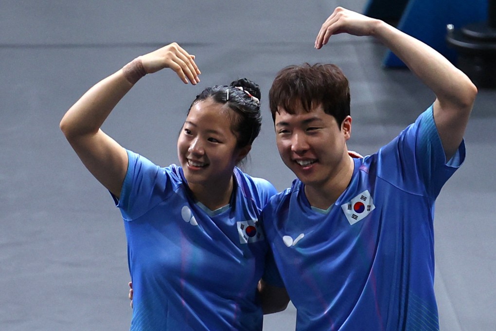 South Korea’s Shin Yubin and Lim Jong-hoon celebrate beating the Hong Kong pair. Photo: Reuters