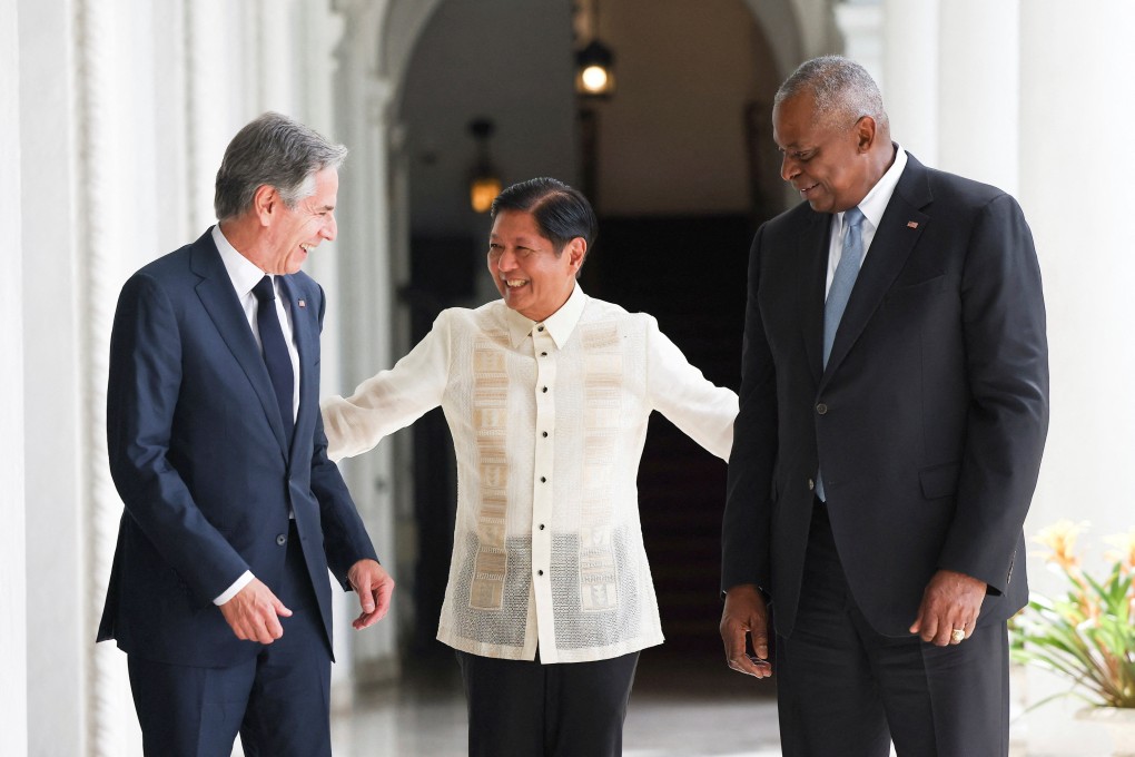 Philippine President Ferdinand Marcos Jr. (centre) greets US Secretary of State Antony Blinken (left) and US Secretary of Defence Lloyd Austin after their meeting at the Malacanang presidential palace on Tuesday. Photo: Reuters
