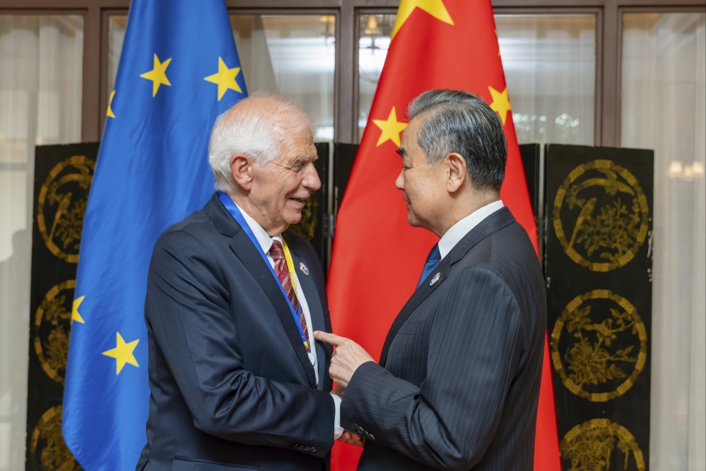 EU foreign affairs chief Josep Borrell (left) meets Chinese Foreign Minister Wang Yi in Vientiane, Laos,  on Friday. Photo: Xinhua