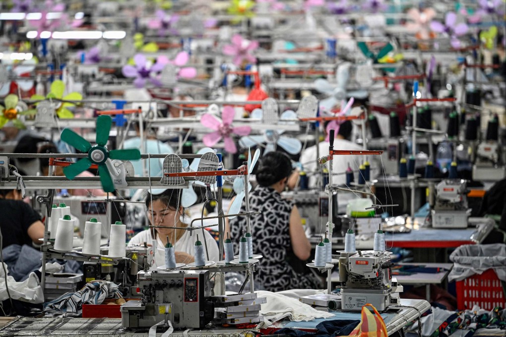 Workers producing garments at a textile factory that supplies clothes to fast fashion e-commerce company Shein in Guangzhou. Photo: AFP