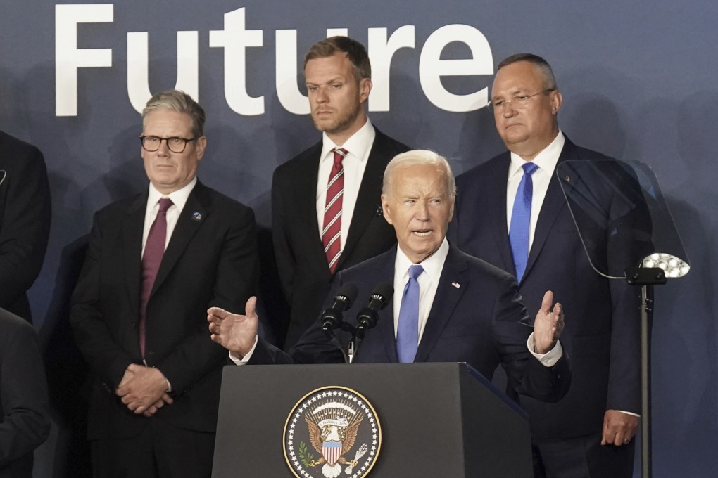 British Prime Minister Keir Starmer (left) looks on as US President Joe Biden speaks during an event at the Nato summit in Washington on July 11. Alliances built with national security at their core are increasingly out of step with the demands of a world in need of improved human security. Photo: AP