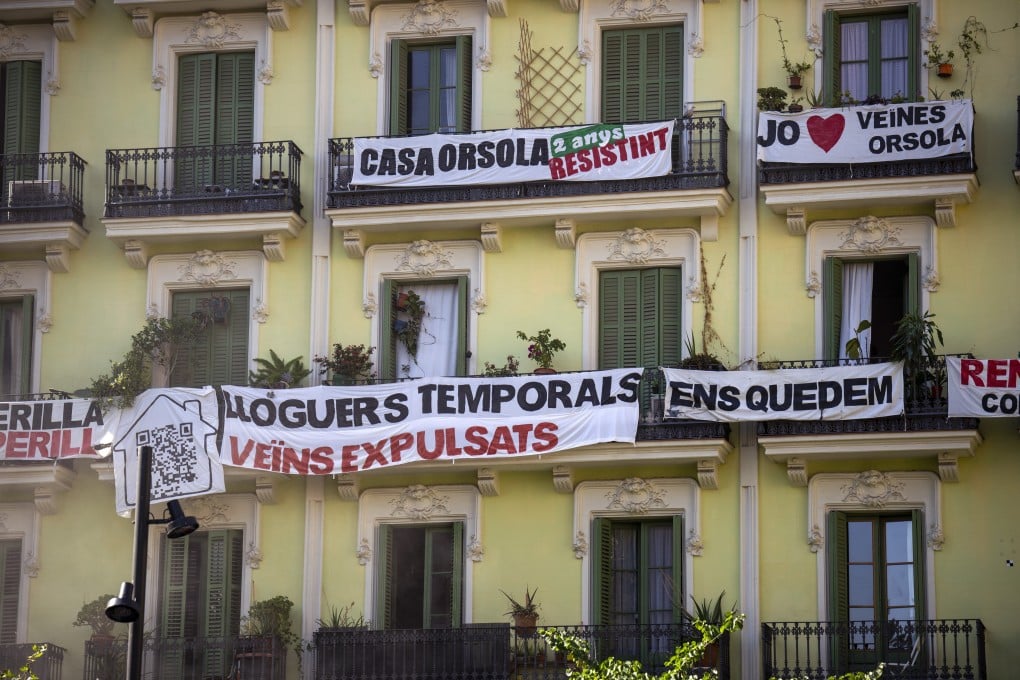 Apartments in Barcelona whose residents are protesting against eviction to make way for short-term rental units. The Spanish city has announced a ban on such Airbnb-style rental properties from 2028, which could serve as a blueprint for other tourist destinations to follow. Photo: AP