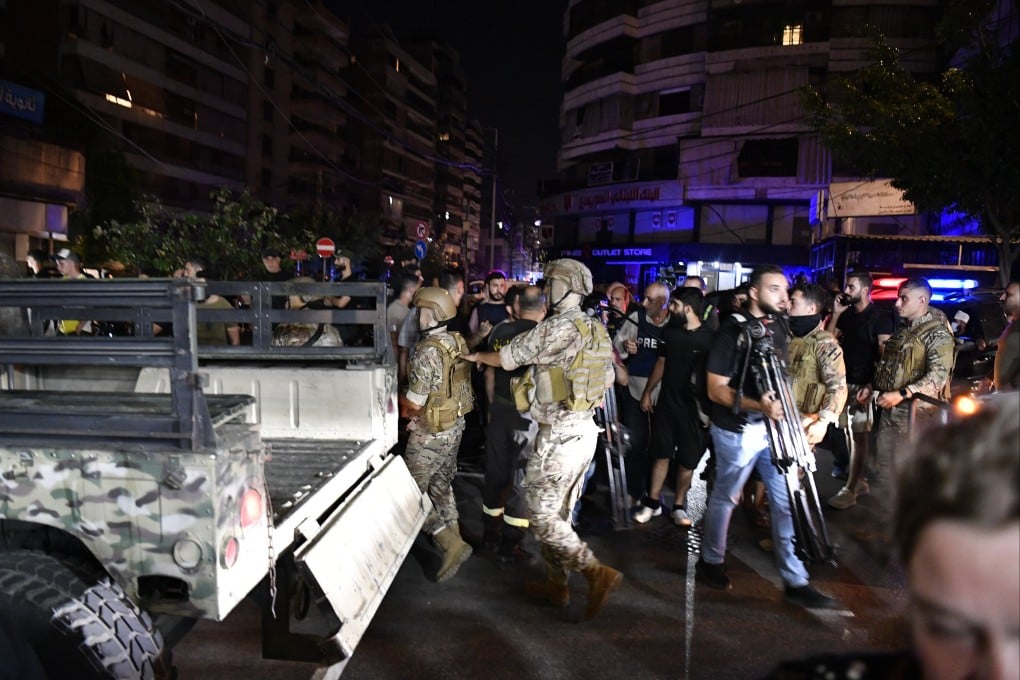 Soldiers near the site that was targeted by an Israeli strike in a southern suburb of Beirut, Lebanon on Tuesday. Photo: EPA-EFE