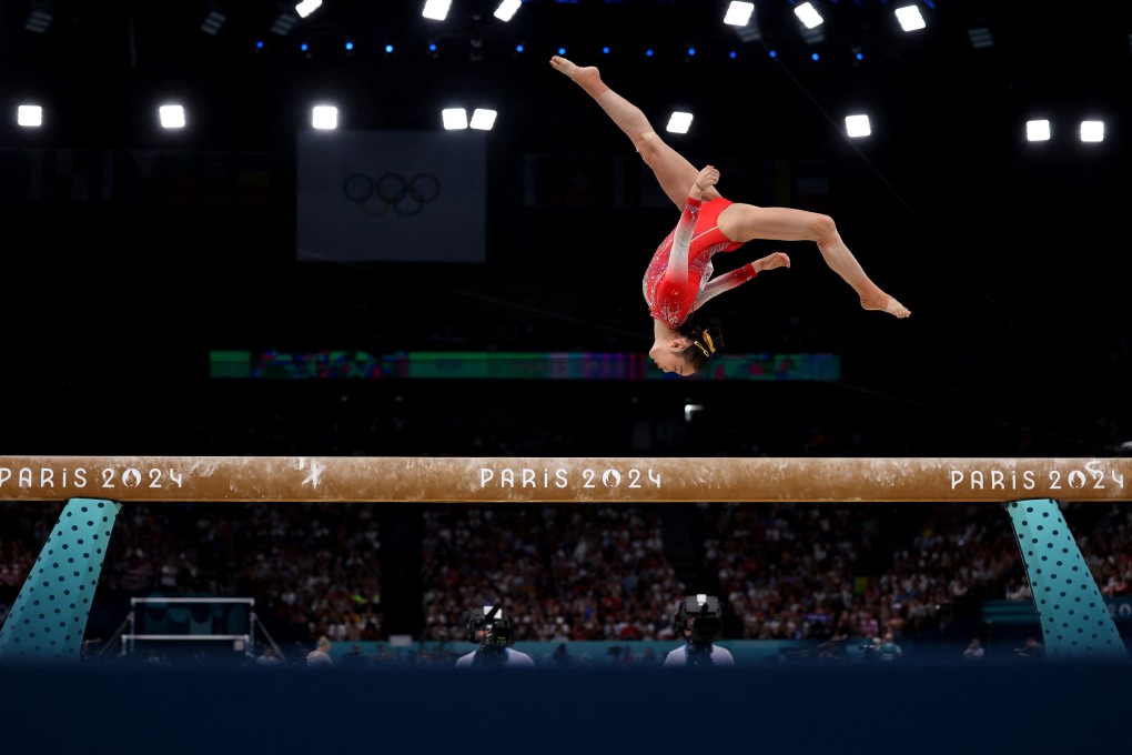 China’s Zhou Yaqin performs on the balance beam at the Paris Olympics. Photo: Reuters