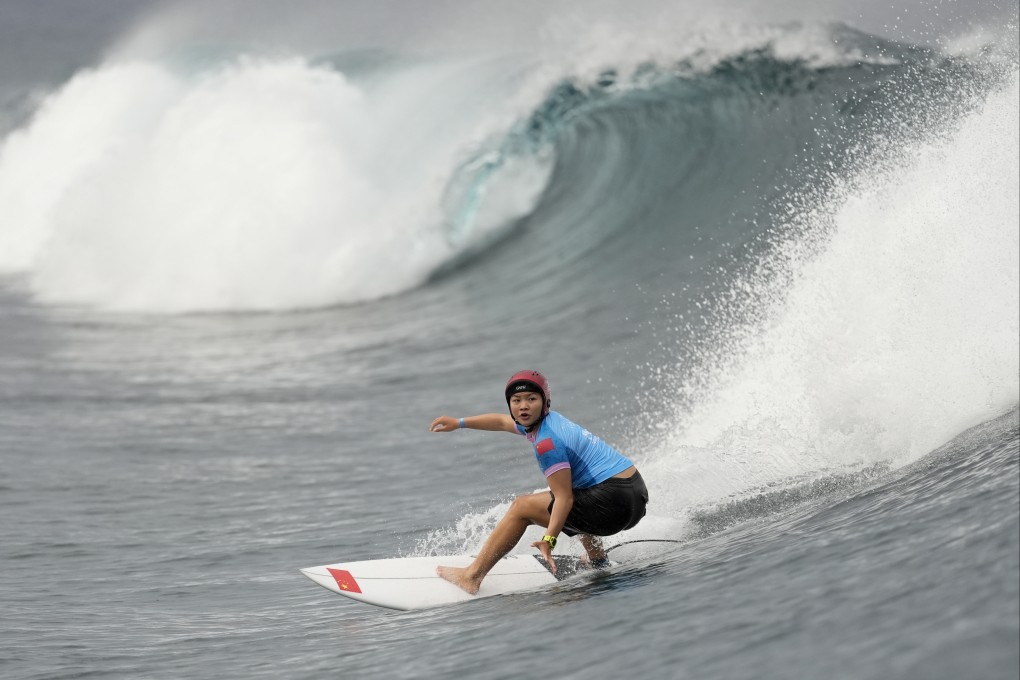 Yang Siqi of China, who is China’s first Olympic surfer, has been described as “an absolute warrior” by sports commentators. Photo: AP