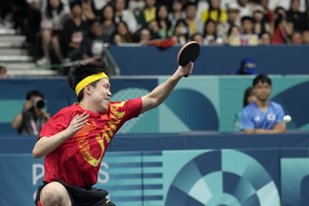 China’s Wang Chuqin had his bat damaged after winning gold in the table tennis mixed doubles. Photo: AP