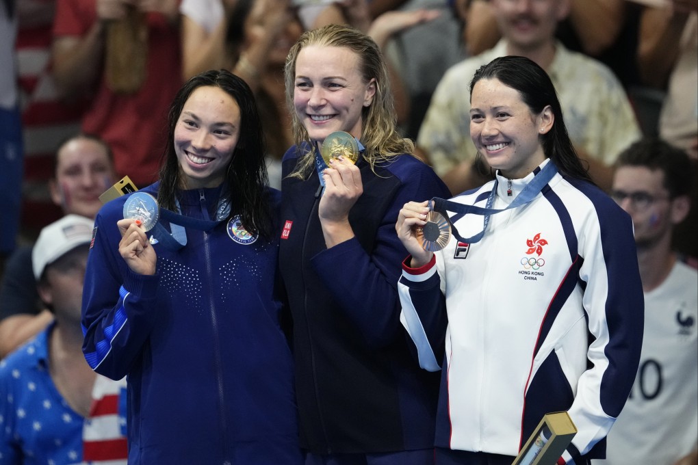 Siobhan Haughey (right) is all smiles as she shows off her bronze medal in the 200 metres freestyle at the Paris Olympics. Photo: AP