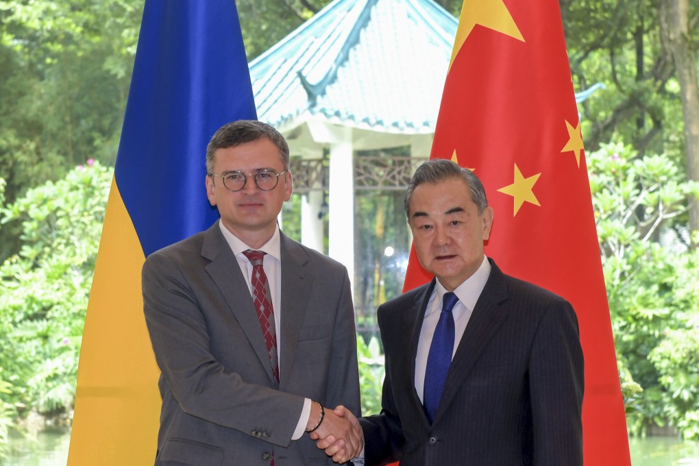 Dmytro Kuleba and Wang Yi pictured during the Ukrainian minister’s visit to China. Photo: AP