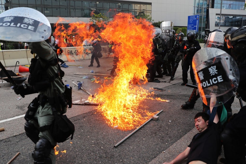Anti-government protesters clash with riot police outside Ngau Tau Kok Police Station. The prosecution asked the jury to consider the political environment of the 2019 unrest. Photo: Hong Kong Press Photographers Association