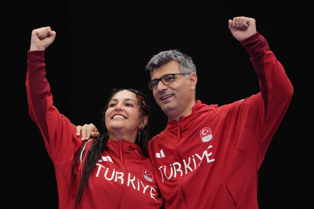 10m air pistol Silver medallists Sevval Ilayda Tarhan and Yusuf Dikec (right). Photo: Reuters