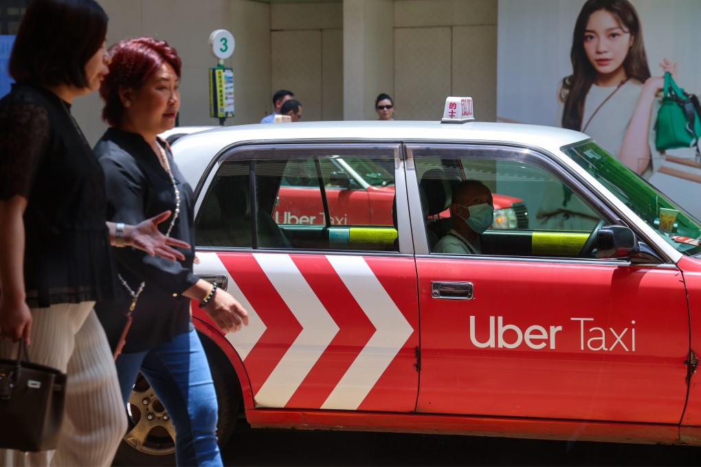 A taxi driver waits for passengers in Tsim Sha Tsui on July 8. Photo: Jelly Tse