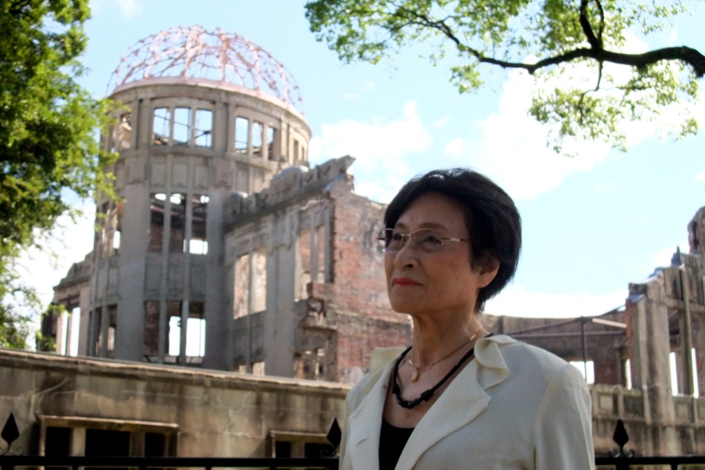 Atomic bomb survivor Bun Hashizume near the Dome in the Hiroshima Peace Memorial Park.  Photo: Kikkawa Hikaru