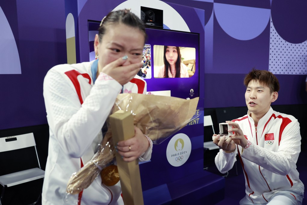 Huang Yaqiong gets emotional as Liu Yuchen (right) proposes at the Paris Olympics. Photo: Xinhua