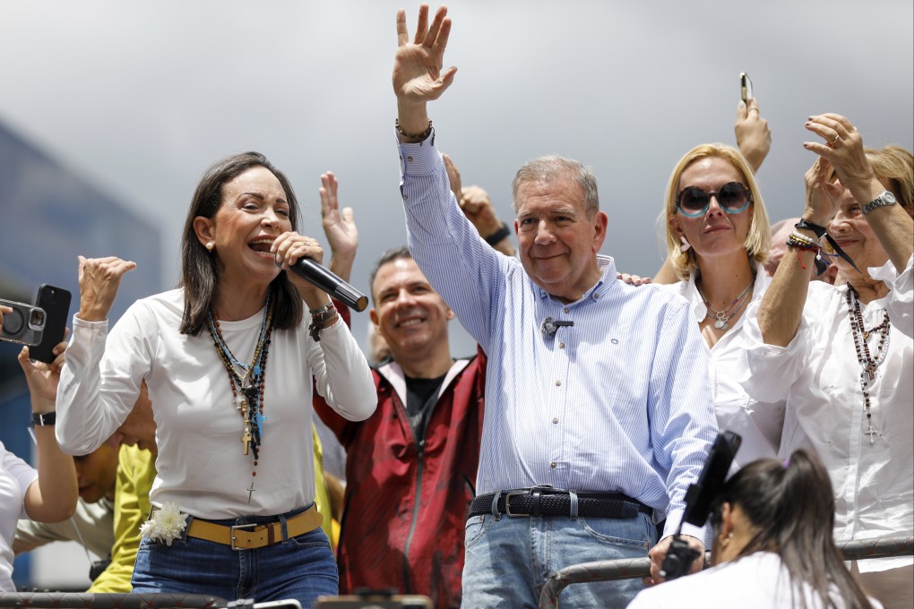 Venezuelan opposition leader Maria Corina Machado, left, and opposition candidate Edmundo Gonzalez address supporters during a protest against the official presidential election results declaring President Nicolas Maduro the winner in Caracas, Venezuela on Tuesday. Photo: AP