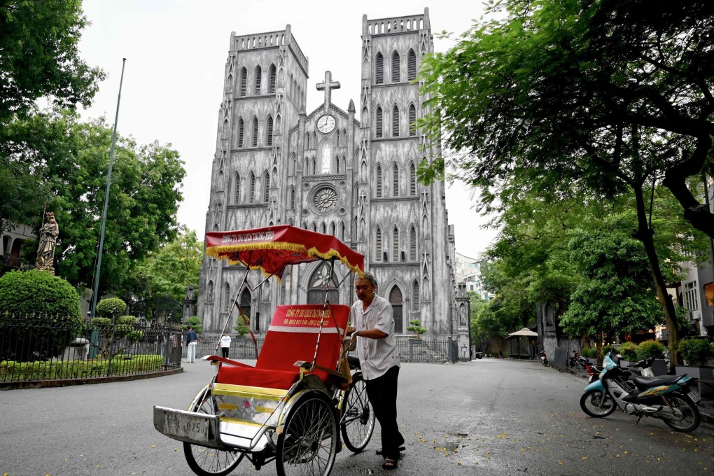 A cyclo driver waits for customers in Hanoi. Vietnam has long sought an upgrade from its listing alongside just 12 economies labelled by Washington as non-market, including China and Russia. Photo: AFP