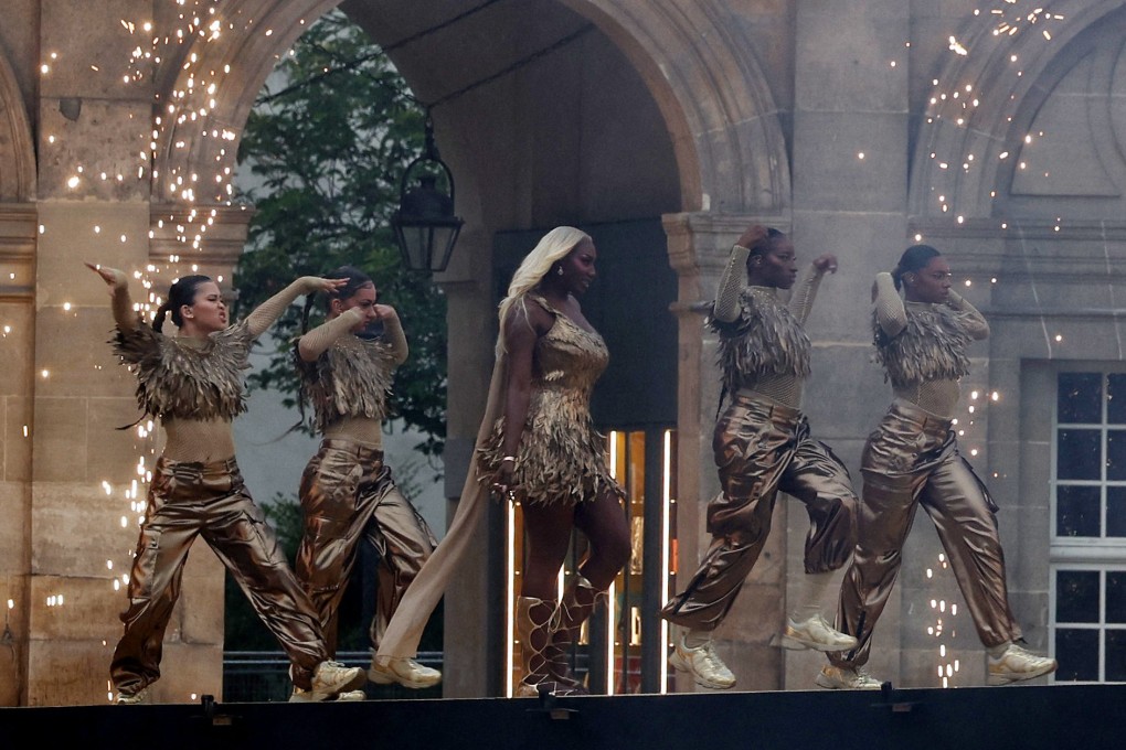 French-Malian singer Aya Nakamura (centre, above) performs during the opening ceremony of the Paris Olympics. A representative of contemporary France, she is notable for her lyrics that incorporate the back slang of the multicultural, multilingual Parisian suburbs. Photo: AFP/Pool