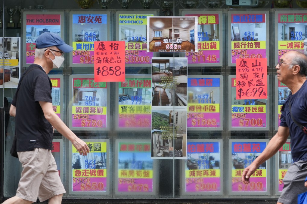 A real estate agency in Tai Koo displays slashed home prices on July 29, 2024. Photo: Eugene Lee