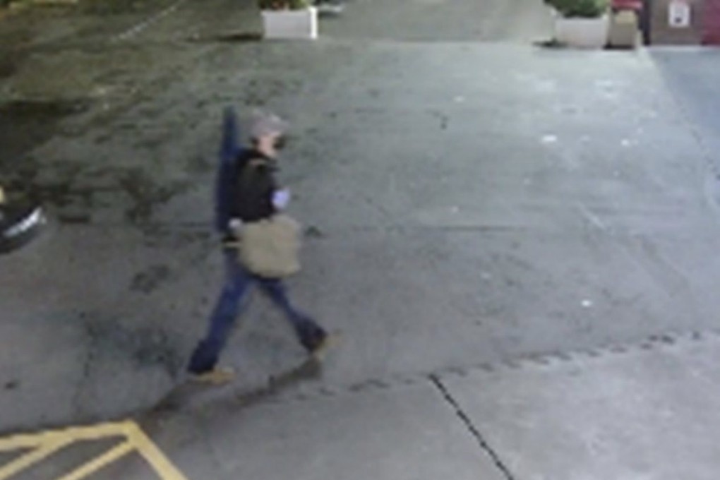 Christopher Rodriguez was captured on camera carrying what appears to be a rifle bag near the Chinese embassy in Washington in September 2023. Photo: US Justice Department