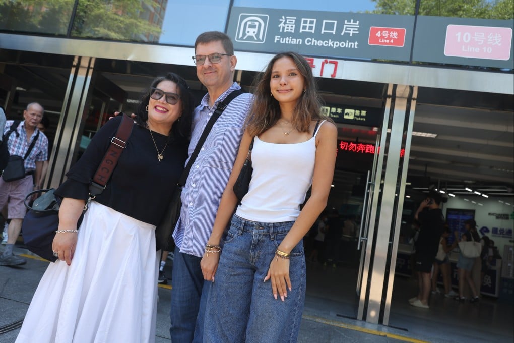 Austrian Alfred Buchner (centre), his wife Lenny and their daughter Patricia are travelling to Shenzhen for the day using their new permits. Photo: Edmond So