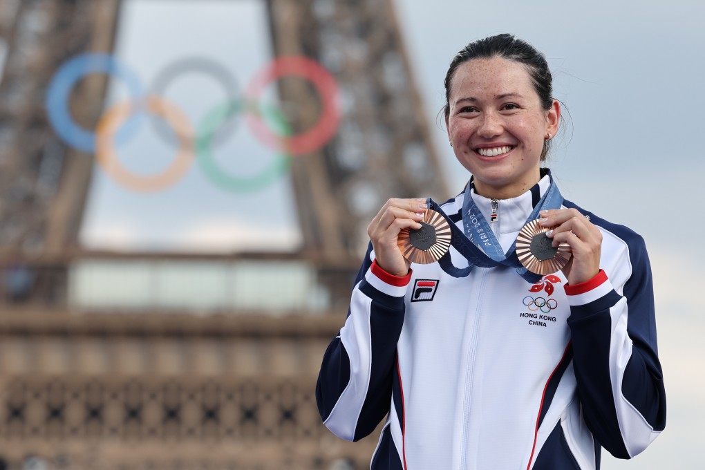 Siobhan Haughey proudly displays her Olympic bronze medals for the women’s 100m and 200m freestyle at the Champions Park. Photo: Xinhua