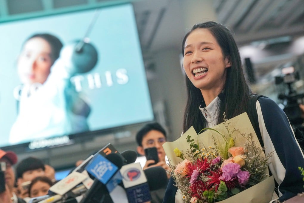Olympic gold-medalist Vivian Kong receives a hero’s welcome at the Hong Kong International Airport on August 1. Photo: Elson Li