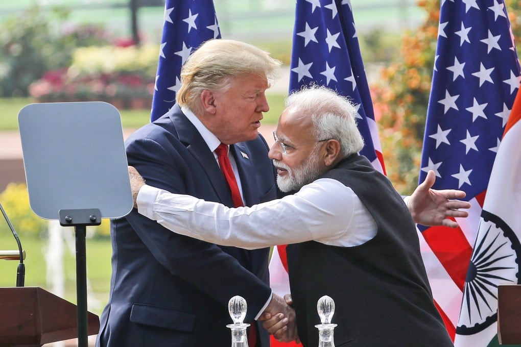 US President Donald Trump and Indian Prime Minister Narendra Modi embrace after giving a joint statement in New Delhi, India, in February 2020. Photo: AP