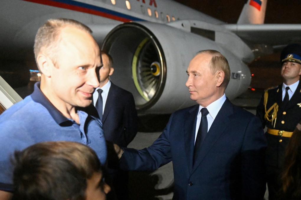 Russia’s President Vladimir Putin welcomes Russian national Artyom Dultsev, who was released in a prisoner exchange between Russia with Western countries, at Vnukovo International Airport in Moscow on August 1. Photo: Pool via Reuters