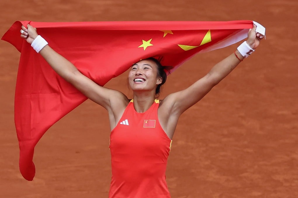 Qinwen Zheng of China celebrates after winning gold against Donna Vekic of Croatia. Photo: Reuters