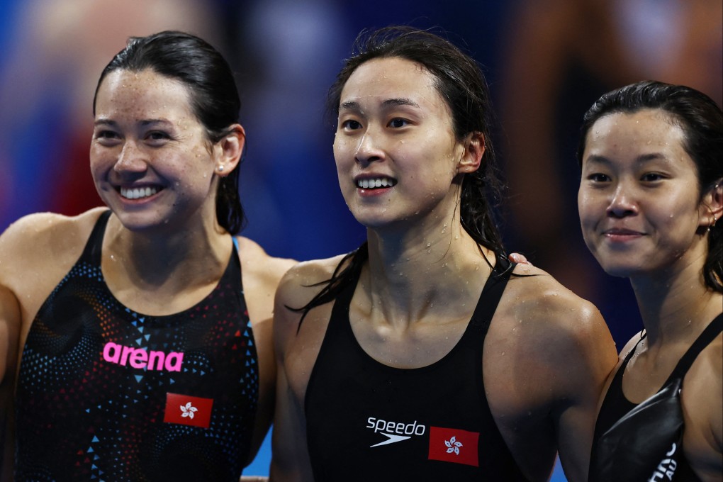 Siobhan Haughey (third from right) praised the longevity of Stephanie Au (far right) in swimming in five Games. Photo: Reuters