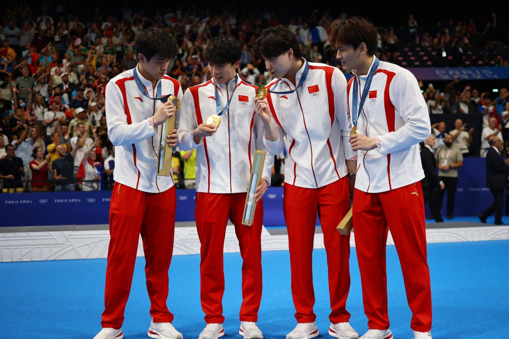 Pan Zhanle (left), with fellow gold medallists (from left) Sun Jiajun, Qin Haiyang and Xu Jiayu. Photo: Reuters