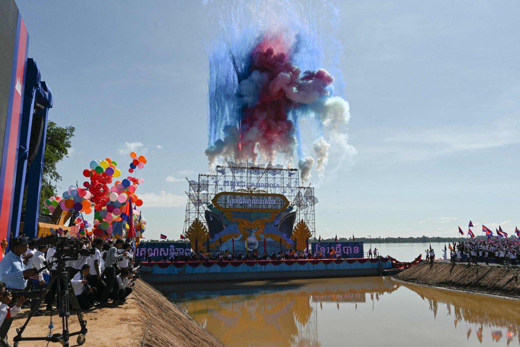 Smoke bombs are ignited during the groundbreaking ceremony of the Funan Techo Canal in Kandal province. Photo: AFP