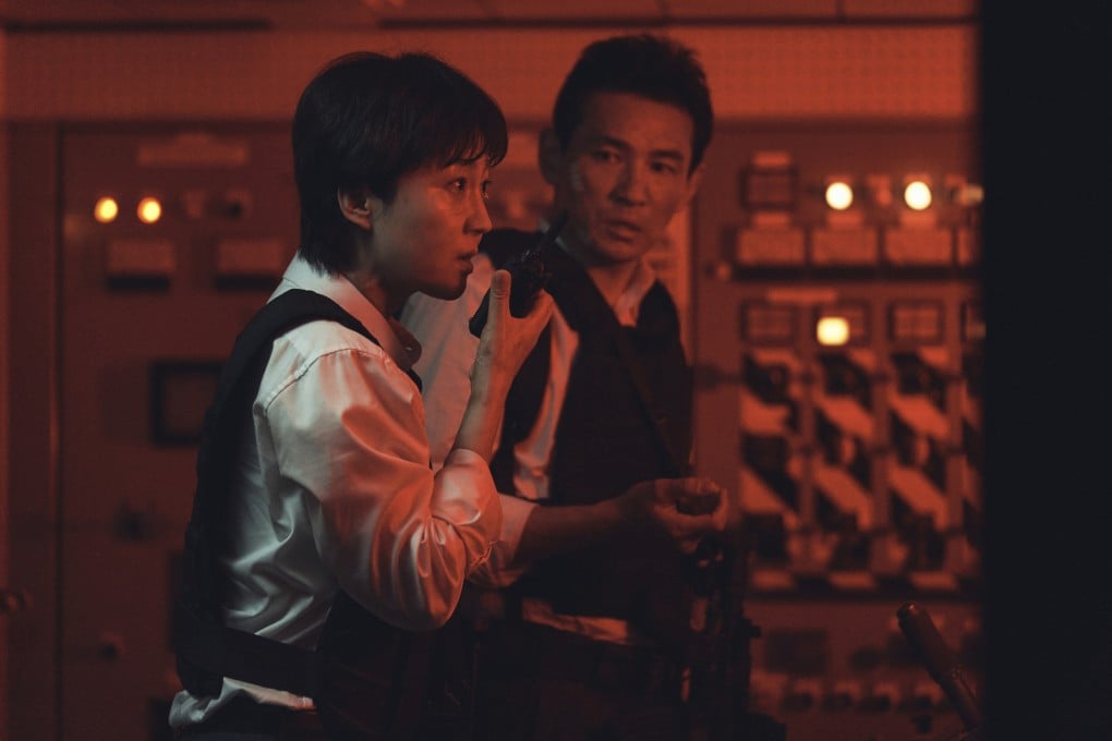 Yum Jung-ah (left) as a detective and Hwang Jung-min as her husband and former special forces operative in a still from Mission: Cross, directed by Lee Myung-hoon. Photo: Netflix