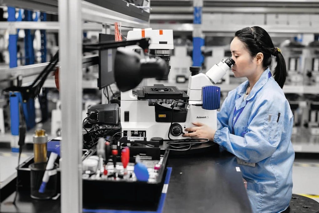 A technician works at a new R&D and manufacturing site in the Suzhou Industrial Park in Jiangsu province last month. Photo: Suzhou Industrial Park