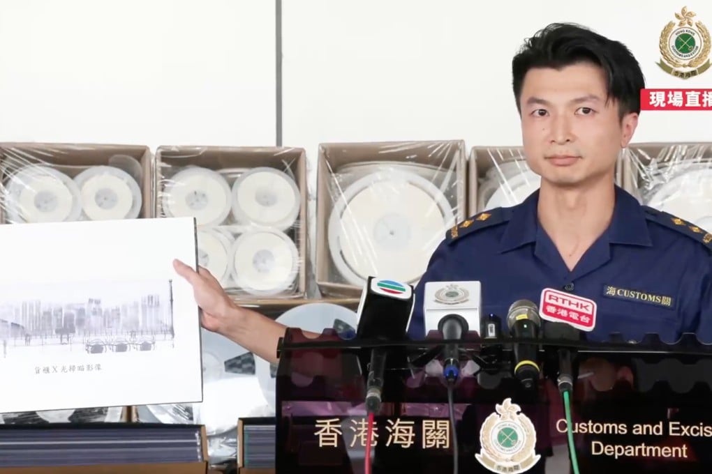 Hong Kong customs displays some of the contraband electronic products seized in the Malaysia-bound shipment. Photo: Facebook