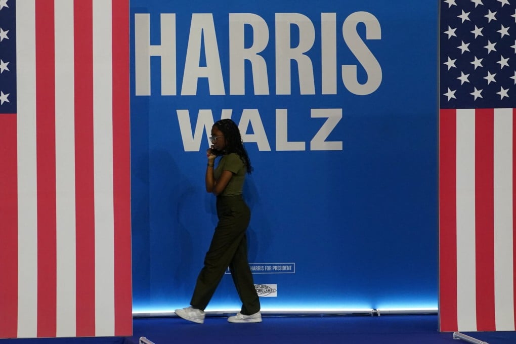 A campaign worker crosses the stage where US Vice-President Kamala Harris and her running mate Governor Tim Walz of Minnesota would be making their first joint appearance in Philadelphia on Tuesday. Photo: Reuters