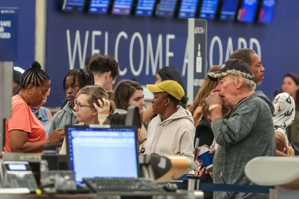 Passengers seek assistance at Delta ticket counters at Hartsfield-Jackson International Airport on July 24, 2024. Photo: TNS