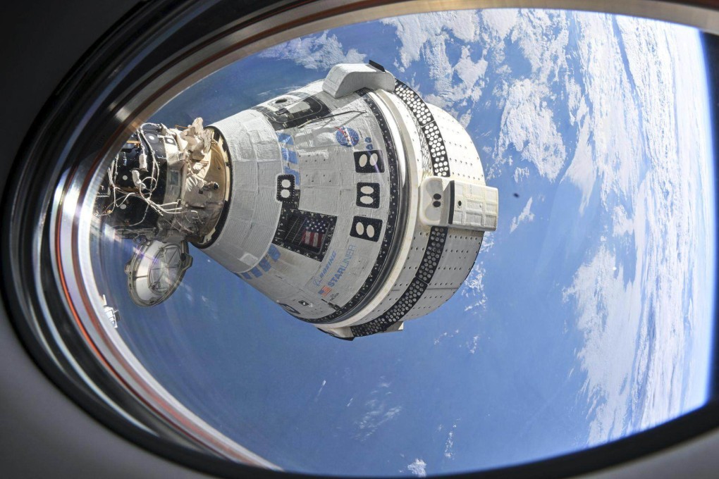 Boeing’s Starliner spacecraft is seen docked at the International Space Station in July. Photo: Nasa via AP