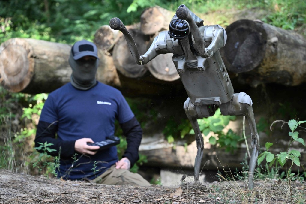 Operator “Yuri” shows the capabilities of a robot dog at an undisclosed location in Ukraine. Photo: AFP