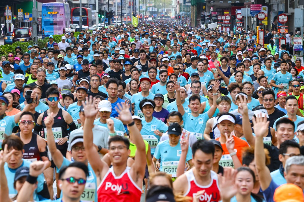 Participants run through Mongkok during the Standard Chartered Hong Kong Marathon in January. Photo: Dickson Lee