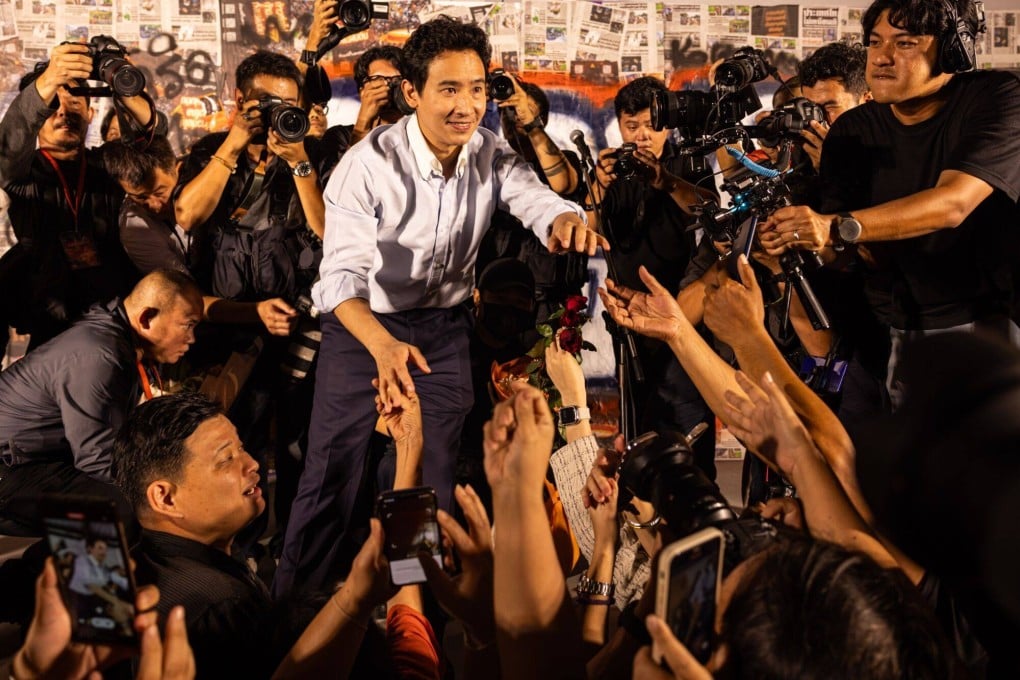 Pita Limjaroenrat, leader of the Move Forward that was the largest force in parliament until the Constitutional Court dissolved the party on Wednesday, greets supporters at the party’s headquarters in Bangkok. Photo: Bloomberg