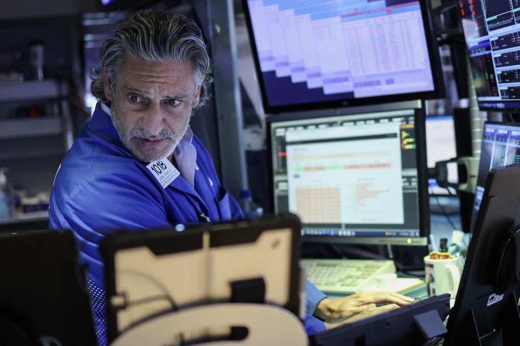 A trader works on the floor of the New York Stock Exchange ahead of the closing bell in New York on August 5. Investors have become more sensitive to the risk of a sharper slowdown in the US economy. Photo: AFP
