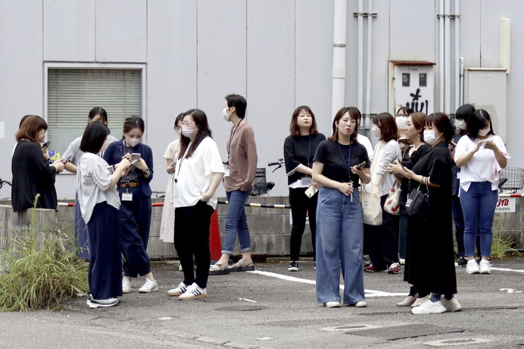 People in Miyazaki evacuate buildings after an earthquake struck off the island of Kyushu. Photo: AP