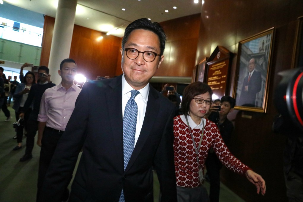 Former Legco secretary general Kenneth Chen (centre) also served as a director of the Hong Kong Jockey Club’s racecourse business before joining the government in 2008. Photo: Dickson Lee