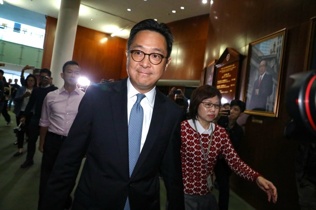 Former Legco secretary general Kenneth Chen (centre) also served as a director of the Hong Kong Jockey Club’s racecourse business before joining the government in 2008. Photo: Dickson Lee