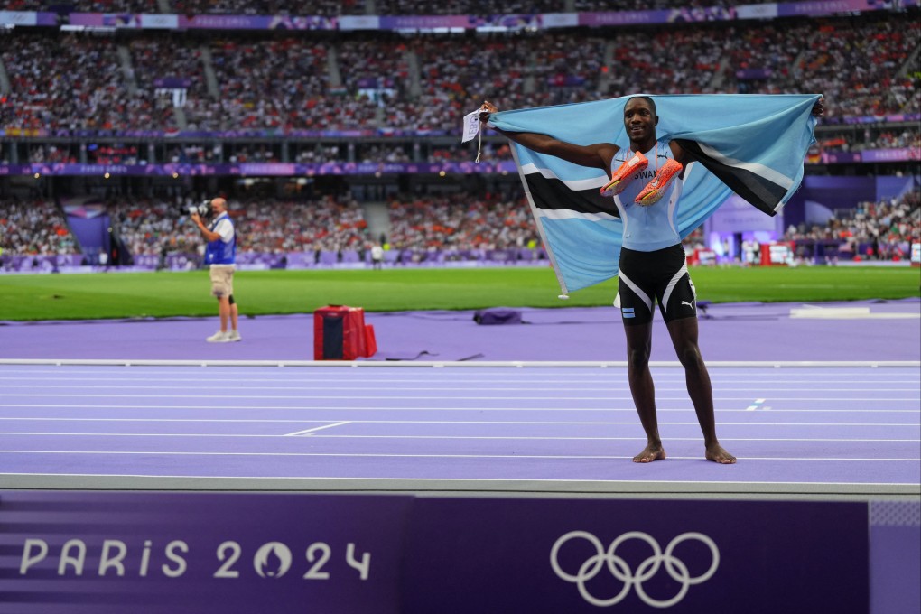 Letsile Tebogo of Botswana celebrates winning gold in the men’s 200m. Photo: Reuters